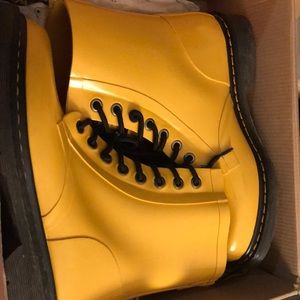 Yellow Dr. Martens rain boots